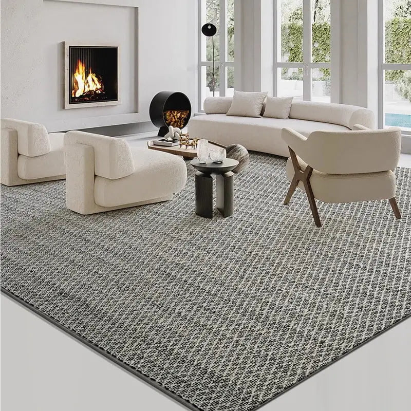 Modern living room with a geometric-pattern area rug in black-and-white tones, featuring a cozy fireplace and minimalist furniture #Texture_Black & White Checks