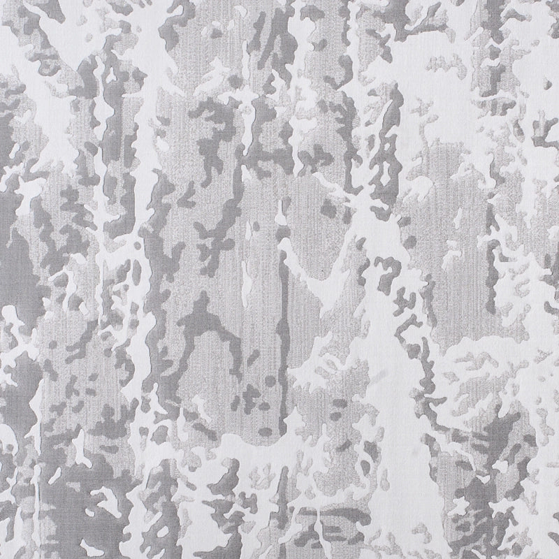 Close-up of an abstract gray rug with intricate textured patterns#Texture_Stormy Texture