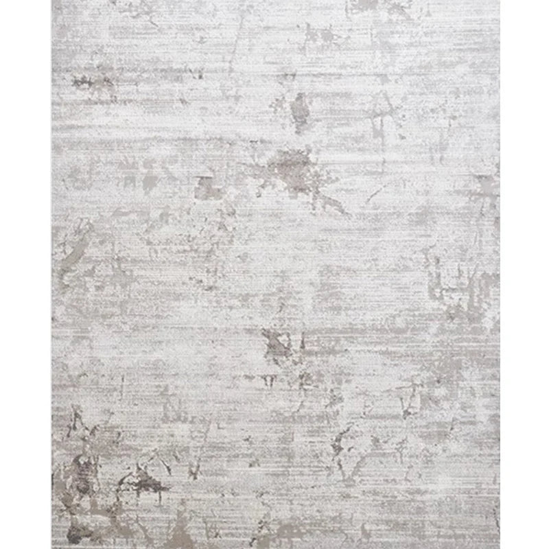 Abstract pattern rug featuring neutral tones and a modern artistic design #color_gray