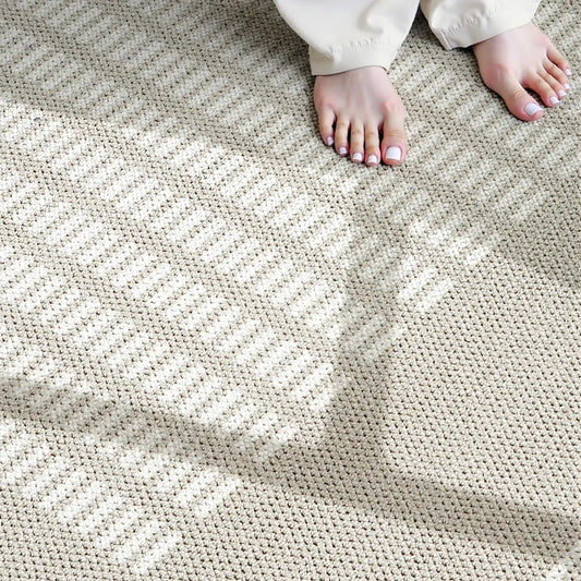 Beige soft touch rug with a dense comfortable surface designed for everyday living