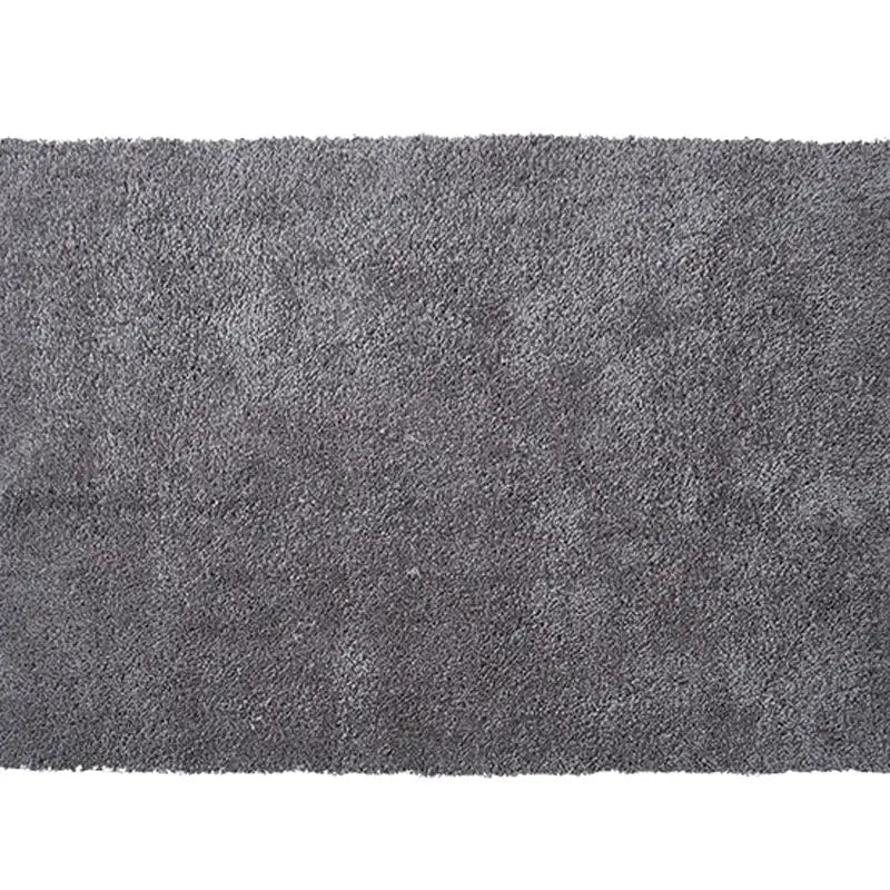 Dark gray shaggy rug, adds elegance and warmth to any modern space #color_Charcoal Gray