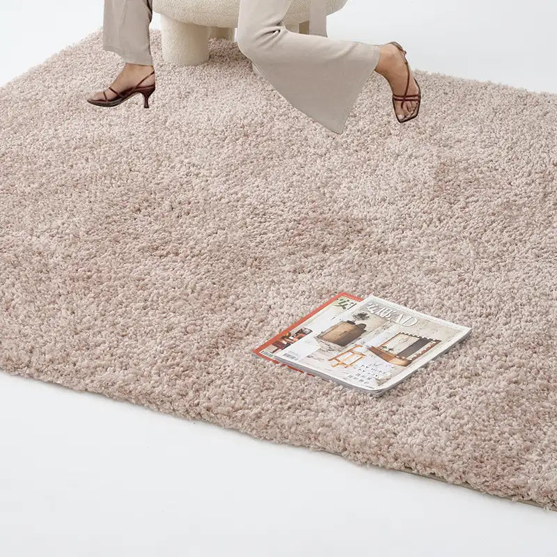 Dusty rose shaggy rug with soft texture, perfect for adding a touch of warmth and style to your living room #color_Blush Beige