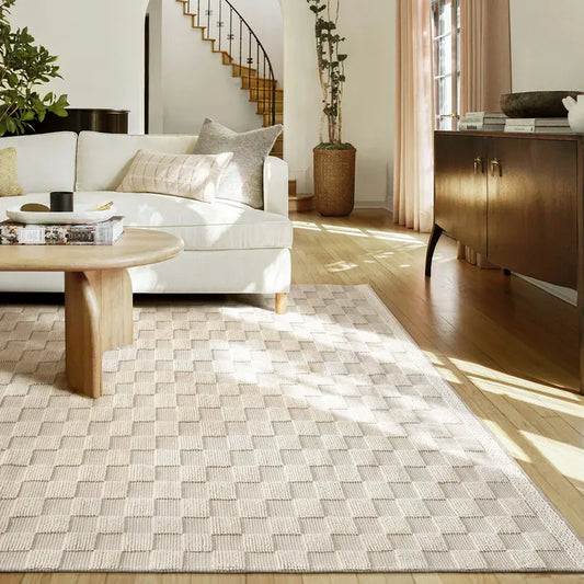Bright living room with a handwoven wool rug, showcasing soft natural tones and texture, paired with modern furniture #color_Beige Texture