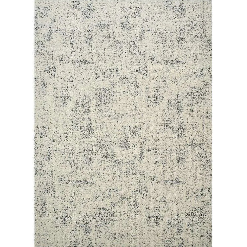 Ivory black wool blend rug with a linear high-low loop pile texture and dense woven construction