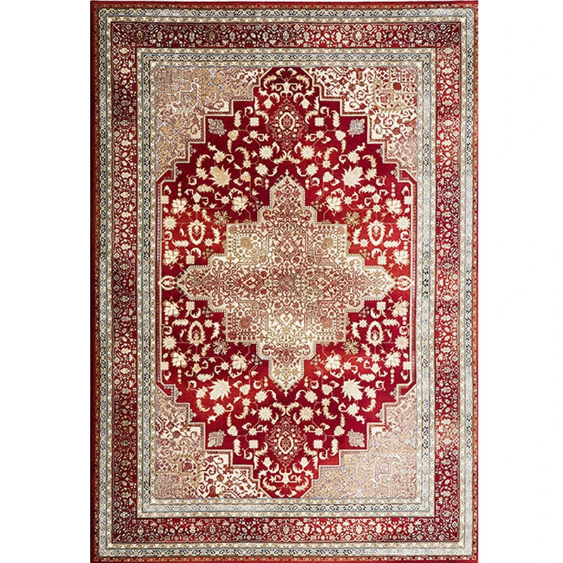 full view of red Persian style area rug with intricate traditional pattern
