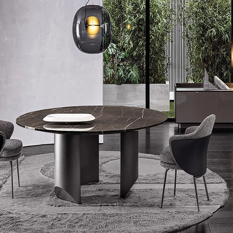 Round gray rug under a marble dining table with modern chairs in a stylish dining room #Shape_Round