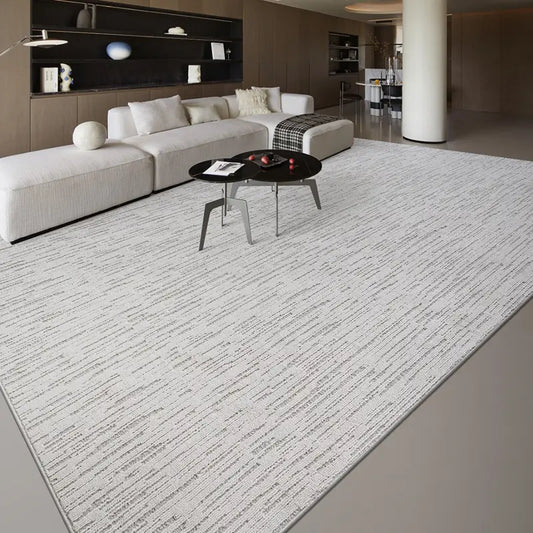 Neutral striped rug in a spacious modern living room with minimalist decor and a comfortable white sofa #Texture_Stripe