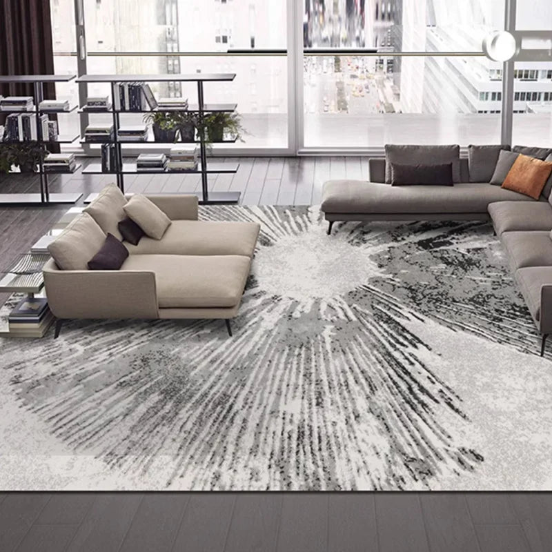 A modern loft living room with a sunburst-patterned gray rug, enhancing the open space with texture and contemporary elegance #texture_Solar Bloom