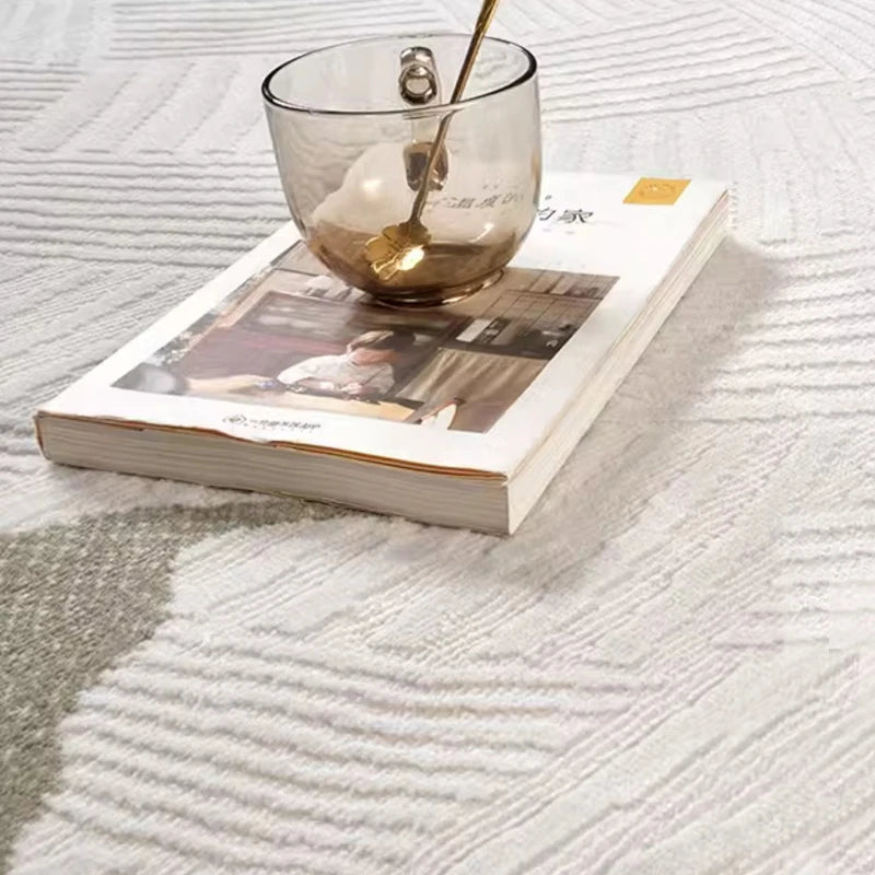 Close-up of a modern 3D woven area rug with a soft textured surface in neutral beige tones, highlighting its intricate pattern, plush feel, and premium craftsmanship