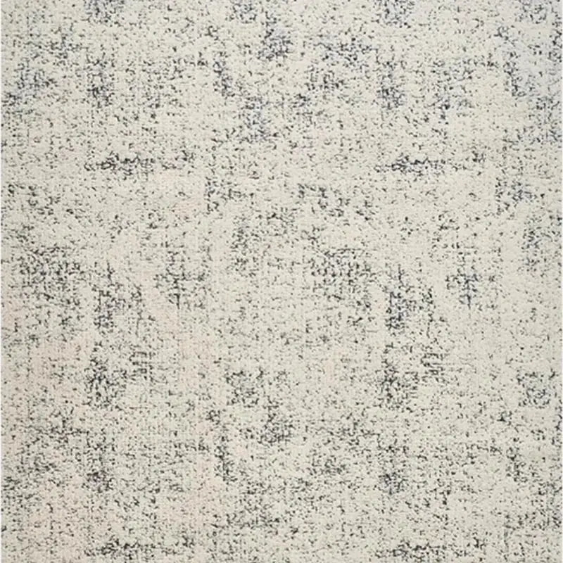 Top view of a minimalist gray and white textured area rug showcasing a subtle modern design #Texture_Gradient Gray