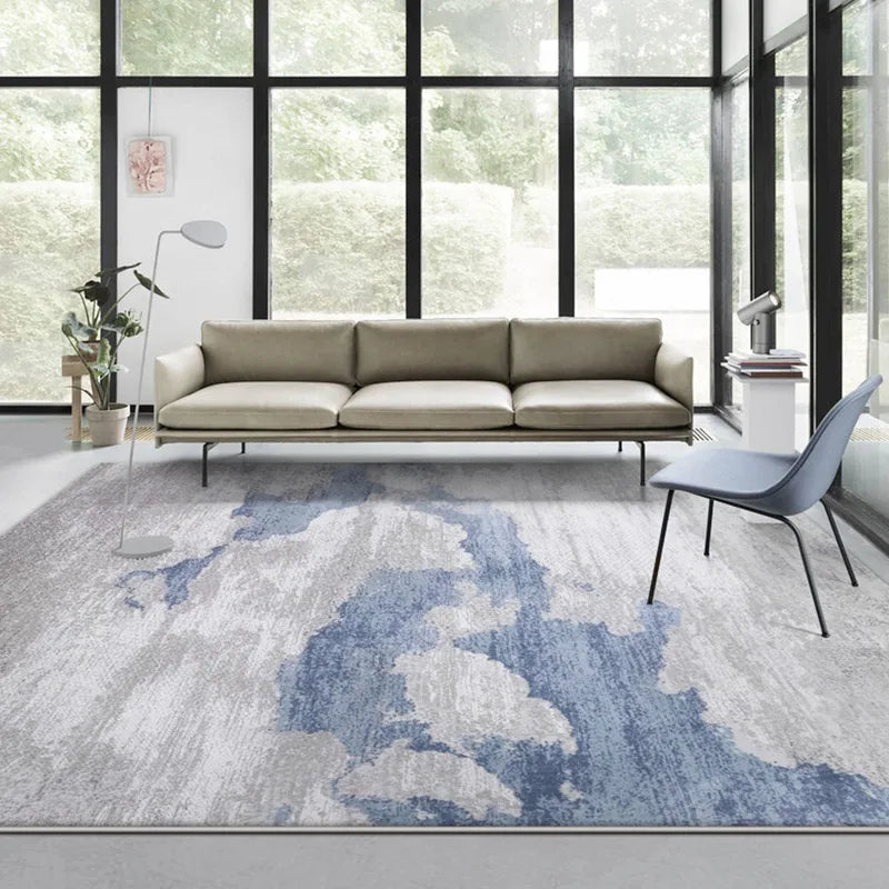 Abstract area rug for modern living room in blue and grey tones, soft texture with natural light space