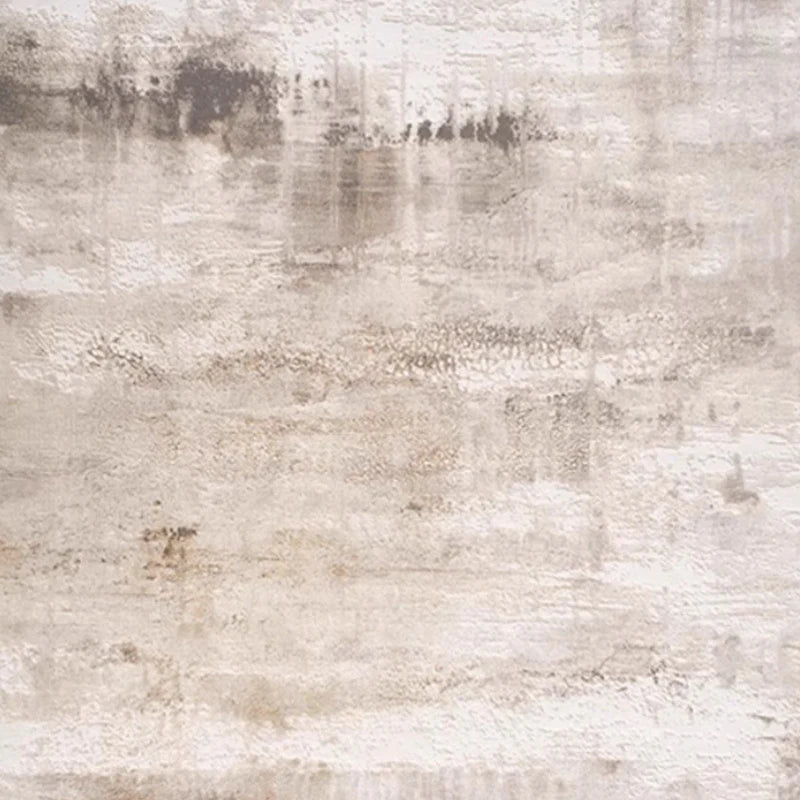 Abstract beige area rug with subtle textured patterns, perfect for modern interiors