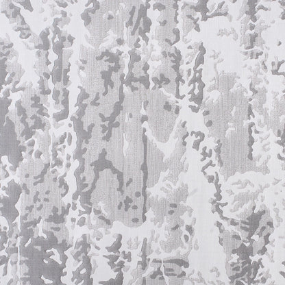 Close-up of an abstract gray rug with intricate textured patterns#Texture_Stormy Texture