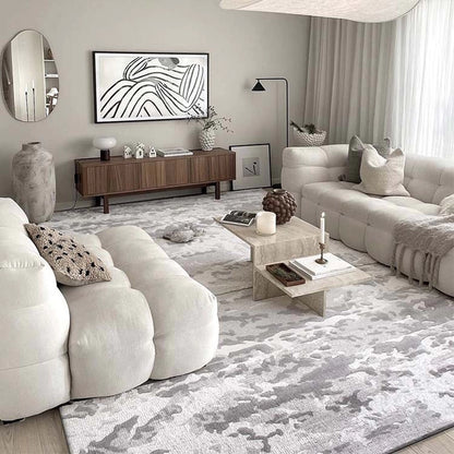 Abstract gray rug in a modern living room with white sofas and a wooden sideboard #Texture_Stormy Texture 