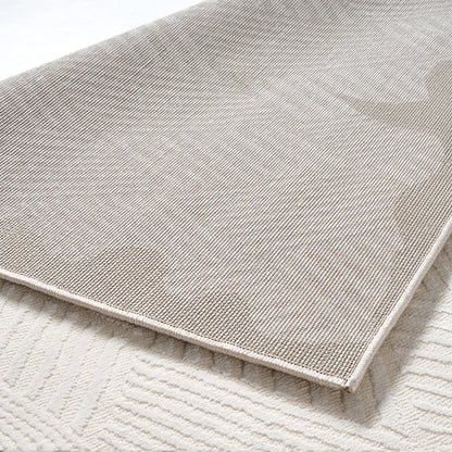 Close-up of a 3D woven area rug showcasing its durable anti-slip jute backing, tightly woven texture, and reinforced edges for enhanced stability and longevity