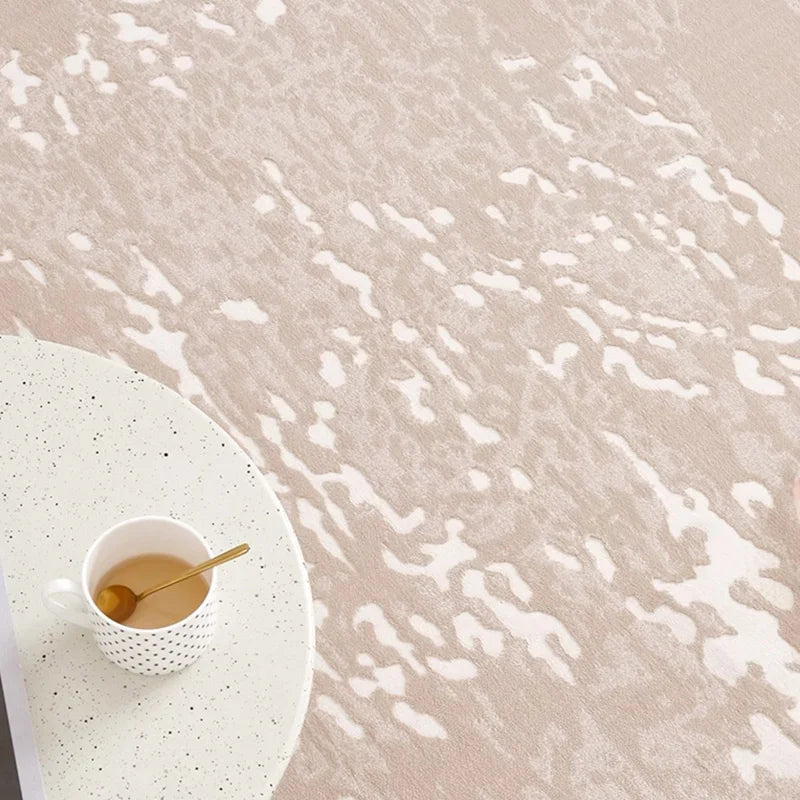 Close-up of a beige abstract rug with artistic patterns, soft plush texture, and a modern minimalist design #Texture_Mist