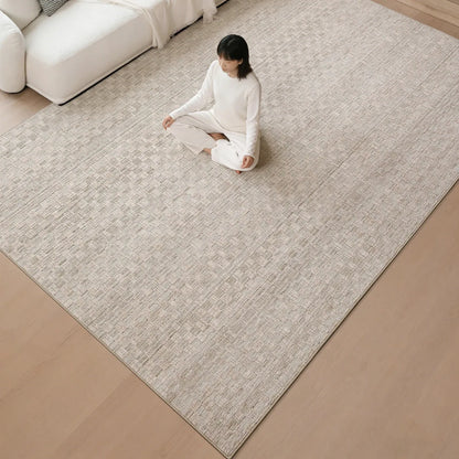 Beige crosshatch woven rug shown from an overhead view with a subtle textured pattern