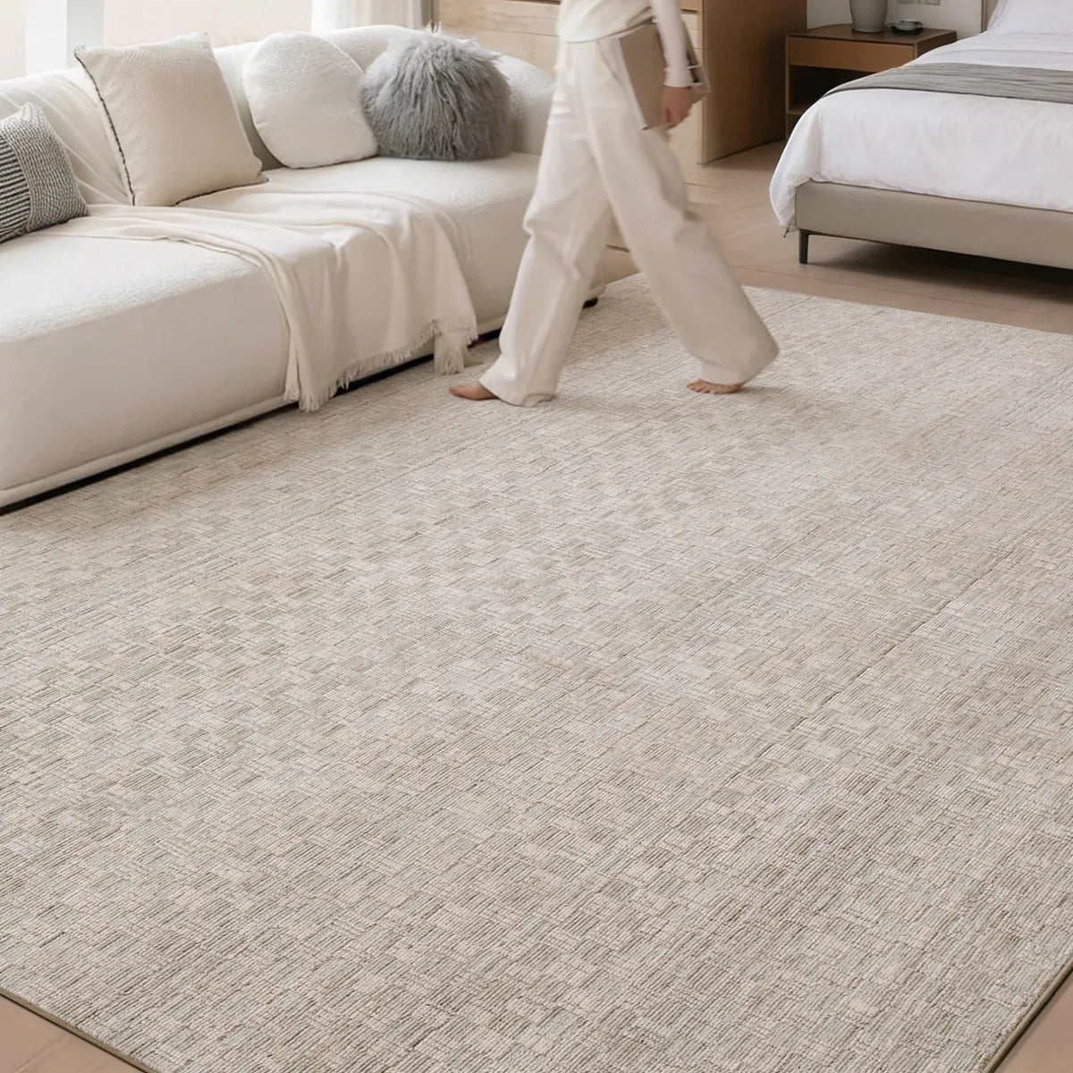 Beige crosshatch woven area rug in a soft neutral room with a subtle textured pattern