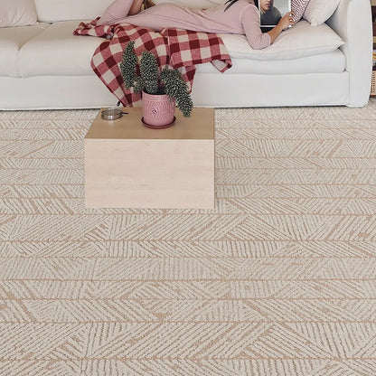 Beige geometric leaf area rug with a dense woven surface and raised loop texture in a modern living room