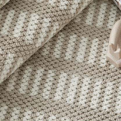 Beige pattern detail rug with a soft woven texture and modern geometric design