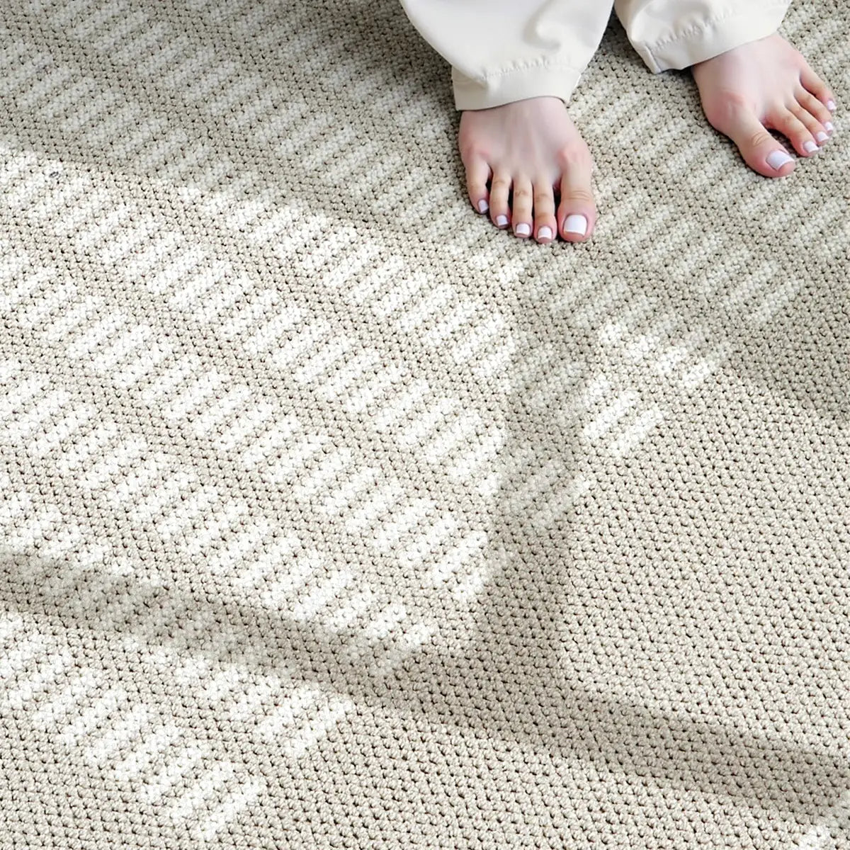 Beige soft touch rug with a dense comfortable surface designed for everyday living