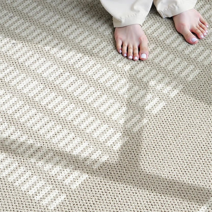 Beige soft touch rug with a dense comfortable surface designed for everyday living