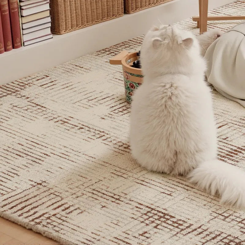 Pet-friendly cream and brown rug with modern abstract pattern, ideal for cozy corners