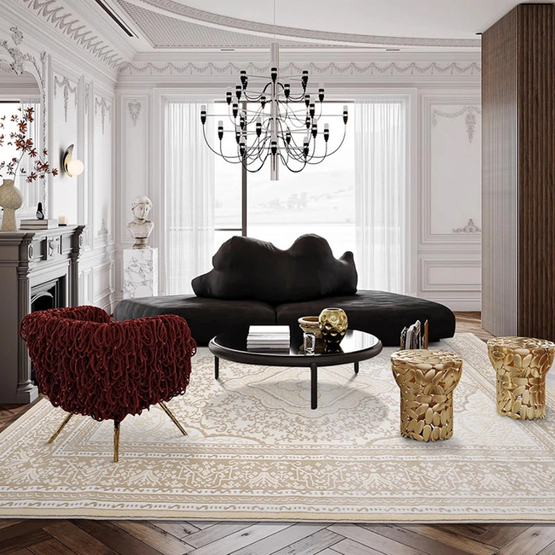 Cream beige medallion Persian rug shown in a living room with dark seating and wood flooring