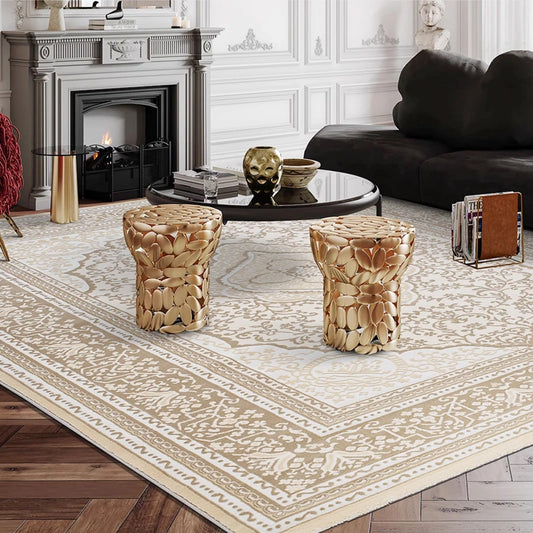 Cream beige medallion Persian rug styled in a living room with dark seating and wood flooring