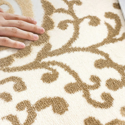 Close-up of a cream beige Persian area rug showing the soft dense pile and detailed woven texture.