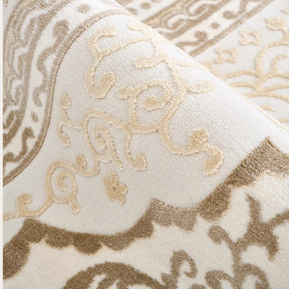 Cream beige Persian rug close-up showing raised traditional patterns and textured woven surface