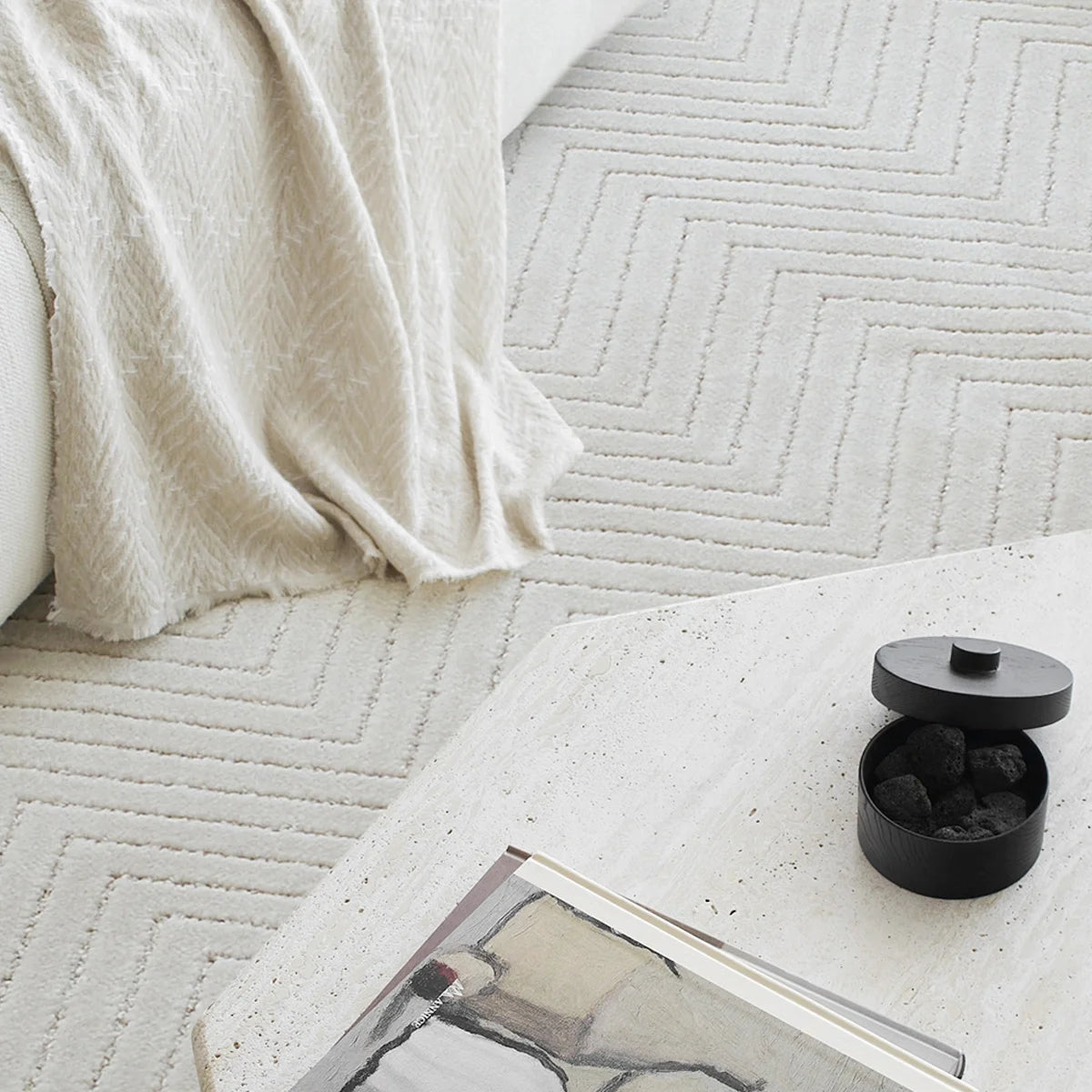 Cream chevron rug edge and surface detail with a soft thick feel and clean modern design