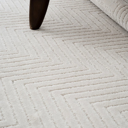 Close up of cream chevron rug texture showing a soft thick surface with dense construction