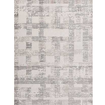 cream and gray geometric area rug shown in full view by Tervannor