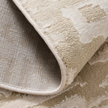 cream area rug with durable jute backing and reinforced edge detail