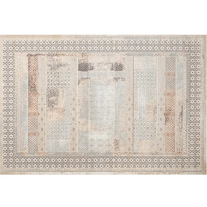 Top view of a detailed bohemian vintage rug showcasing intricate patchwork patterns and neutral tones