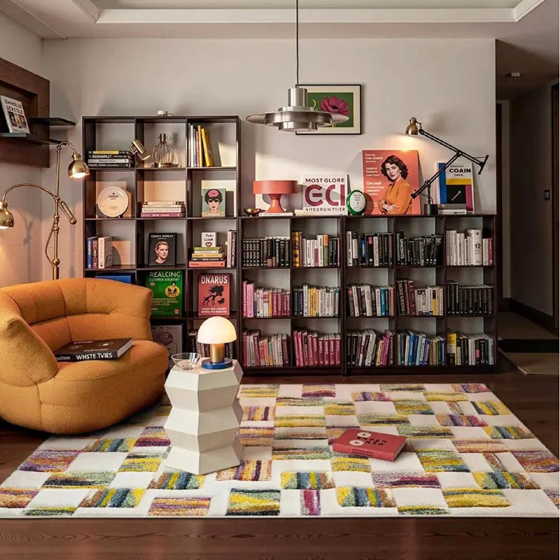 Colorful dopamine-style rug in a stylish reading room with bookshelves, accent chair, and warm lighting
