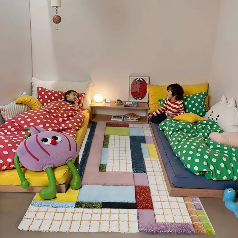 Two kids relaxing in a shared bedroom with a colorful checkerboard rug, surrounded by polka dot bedding and cozy decor.