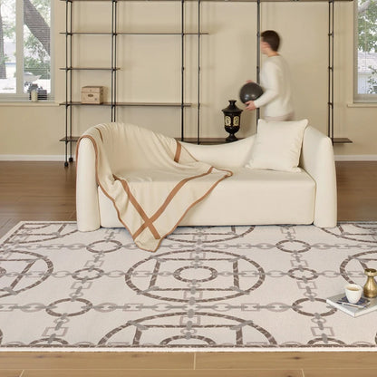 Elegant chain design rug decorating a warm-toned living room with minimalist white furniture and open shelves