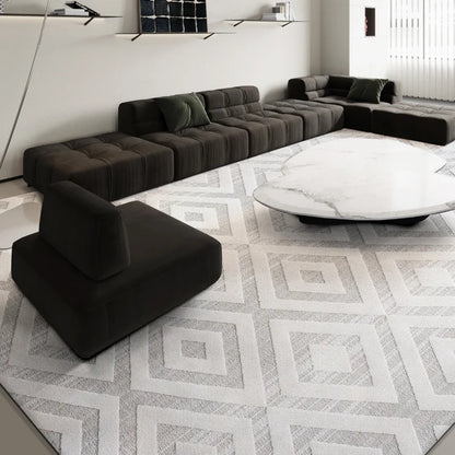 Modern area rug with white and light gray geometric patterns, perfect for minimalistic and contemporary interiors