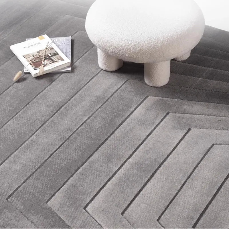 Gradient textured modern area rug with high-low geometric design, paired with minimalist furniture for a cozy and stylish look