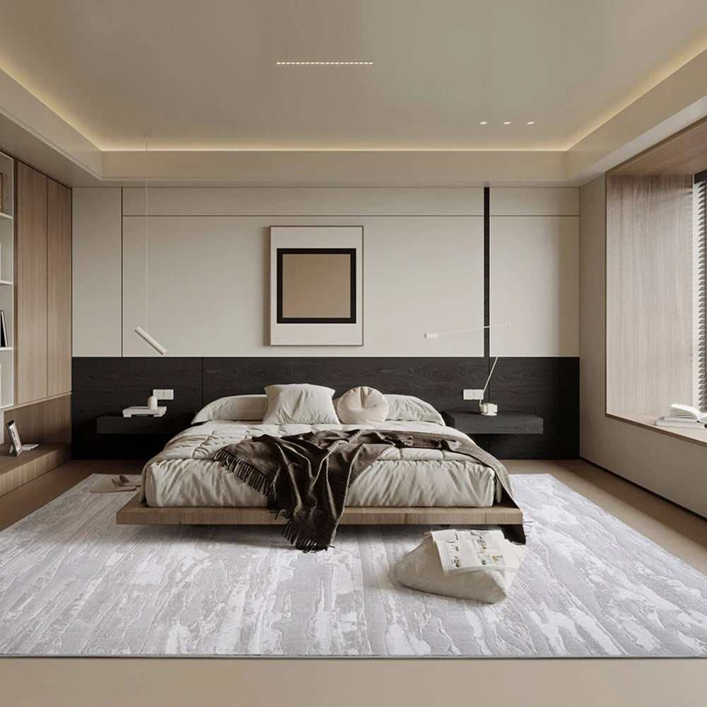 Thick gray textured area rug placed in a calm American-style bedroom, creating a quiet and comfortable sleeping space