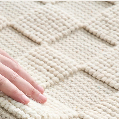 soft wool living room rug hand touch close up thick natural fiber breathable comfortable texture handwoven detail