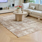 Cream geometric Italian rug in a modern living room, styled with a white sofa, natural wood floor, and soft daylight