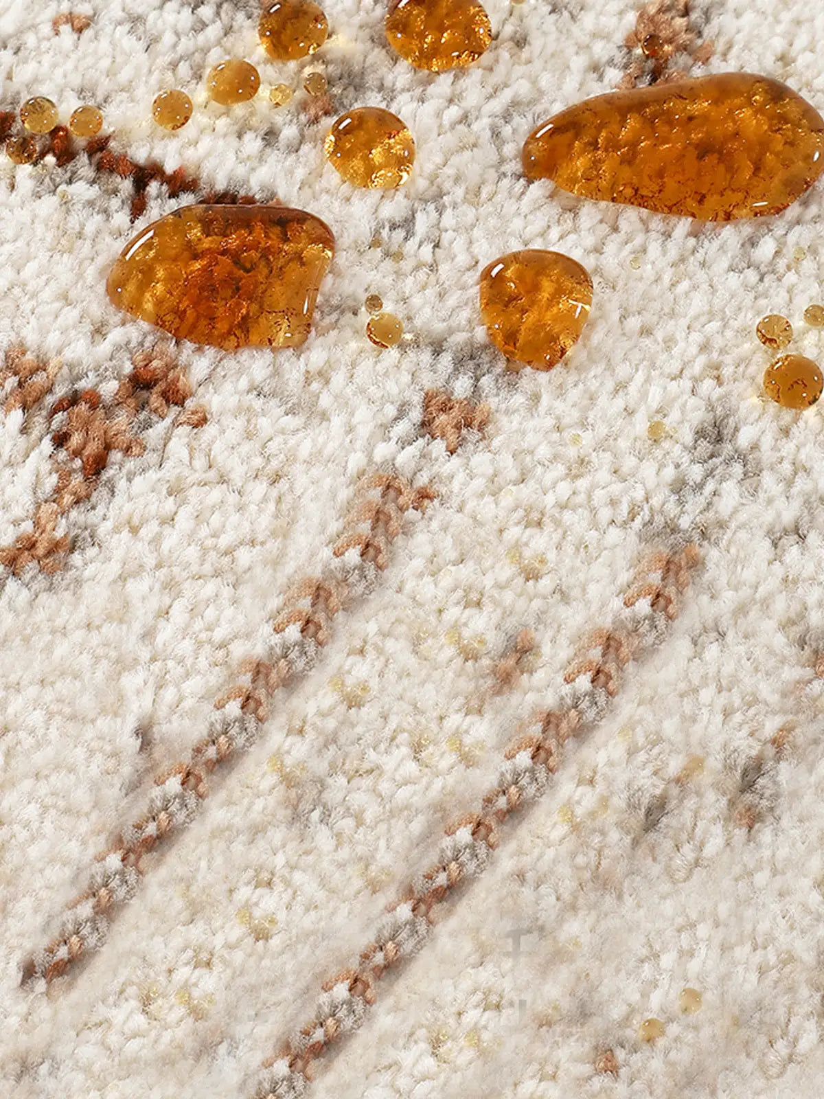 Water-resistant yarn close-up on modern Italian-style rug with beige and rust tones
