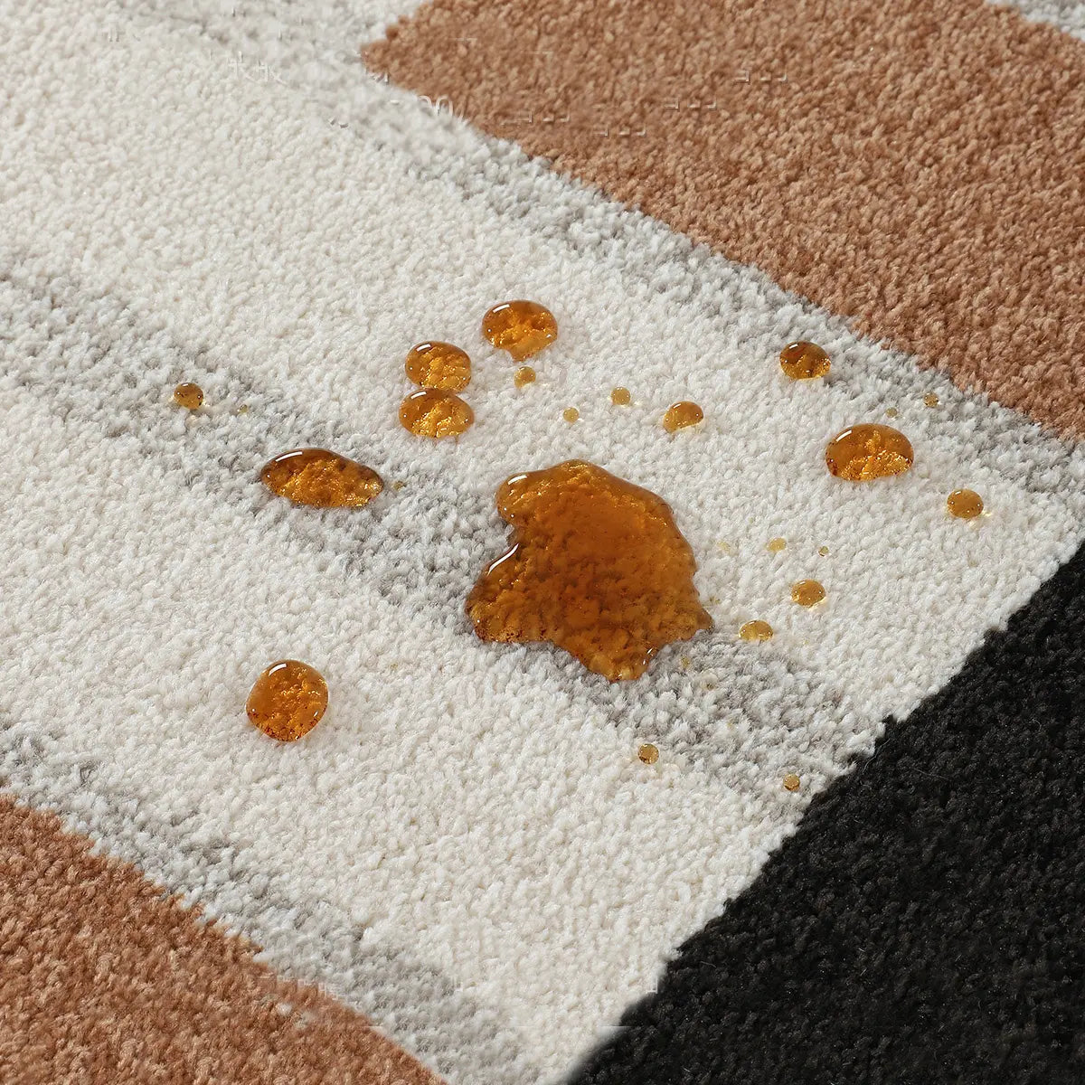 Ivory black camel geometric area rug with spill-resistant surface for easy spot cleaning