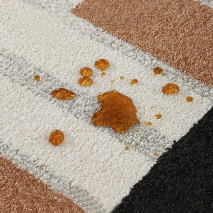 Ivory black camel geometric area rug with spill-resistant surface for easy spot cleaning