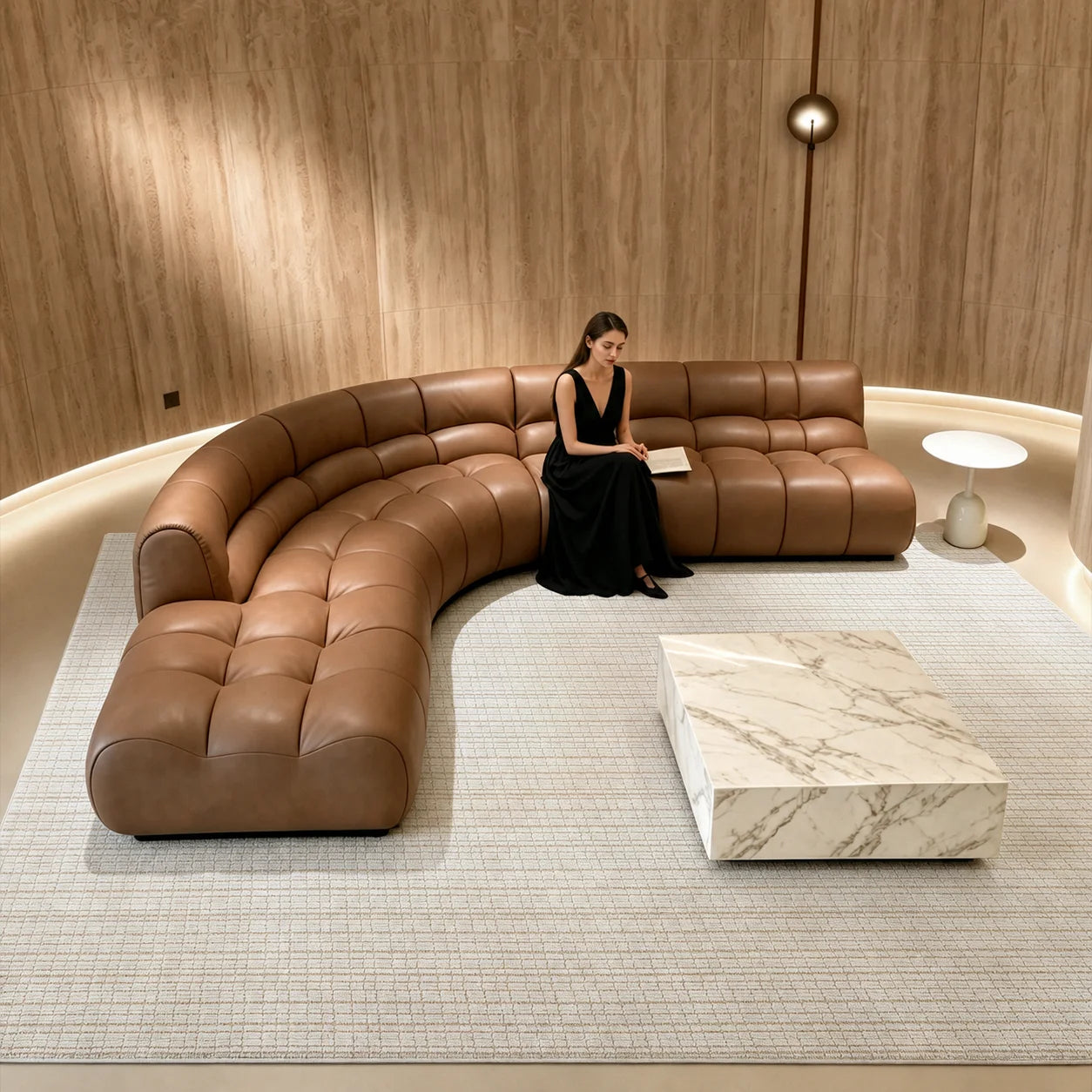 Ivory cut and loop grid area rug styled under a curved brown sofa in a modern living room