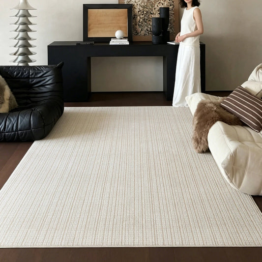 Ivory cut and loop grid area rug styled in a modern living room with console table and sofa seating