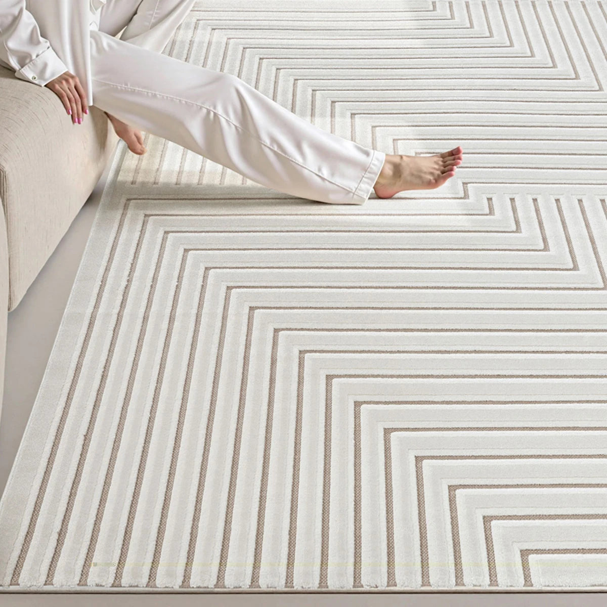 Ivory taupe geometric line rug showing soft high low texture underfoot